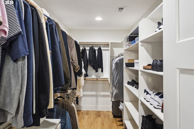 25 SW 143rd Ave, Beaverton, OR 97006 - walk in closet featuring wood finished floors