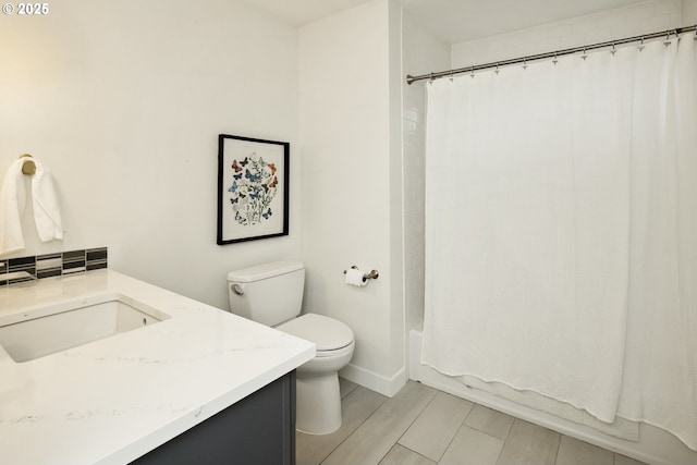 25 SW 143rd Ave, Beaverton, OR 97006 - bathroom featuring vanity, toilet, shower / bathtub combination with curtain, tile patterned flooring, and baseboards