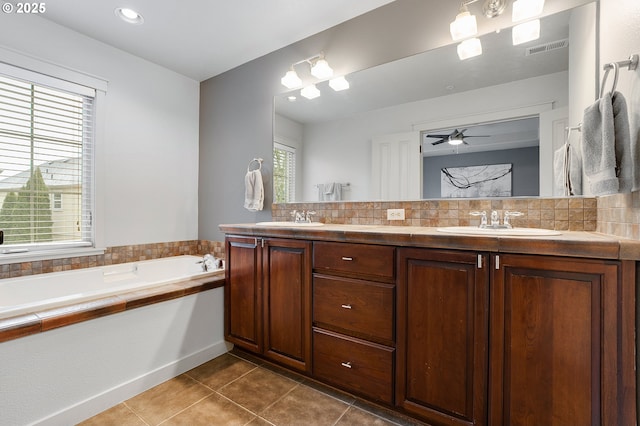 full bathroom with tile patterned floors, visible vents, tasteful backsplash, and a sink