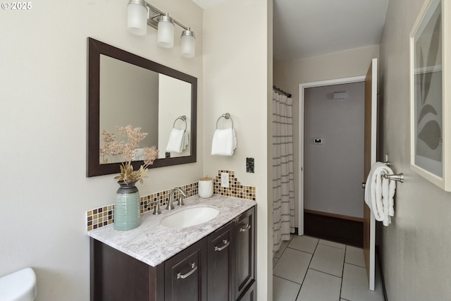 2136 SE Kelly Ave, Gresham, OR 97080 - full bathroom with vanity, tile patterned flooring, and backsplash
