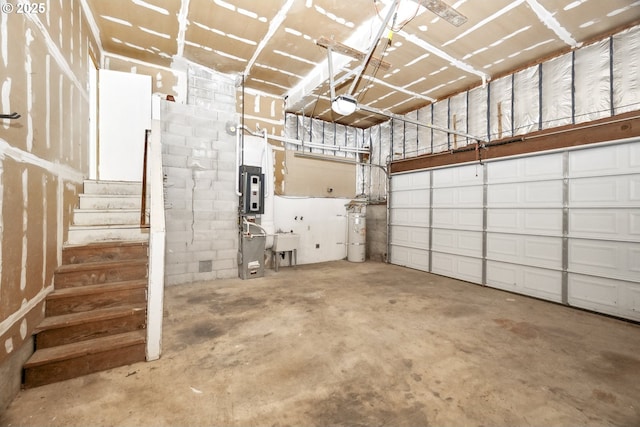 2136 SE Kelly Ave, Gresham, OR 97080 - garage with a garage door opener and a sink