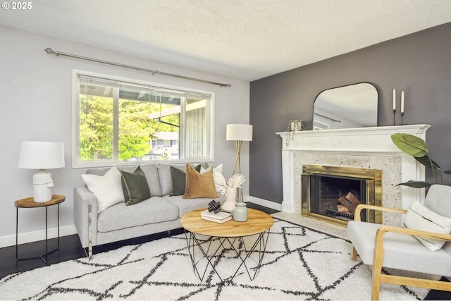 2136 SE Kelly Ave, Gresham, OR 97080 - living room with a premium fireplace and a textured ceiling
