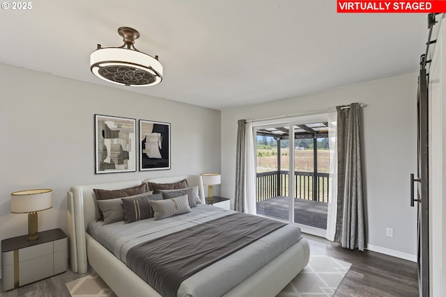 33549 Wikstrom Rd, Scappoose, OR 97056 - bedroom featuring wood finished floors and access to outside