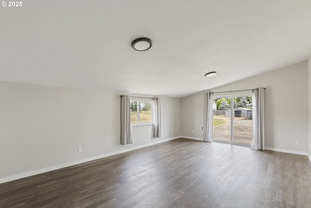 33549 Wikstrom Rd, Scappoose, OR 97056 - spare room with lofted ceiling and dark wood finished floors