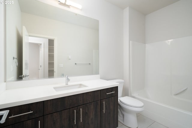 full bathroom with shower / bathing tub combination, tile patterned floors, toilet, and vanity