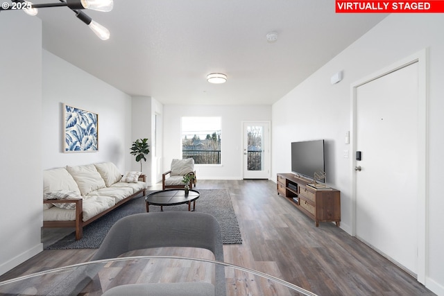 living room featuring dark hardwood / wood-style flooring