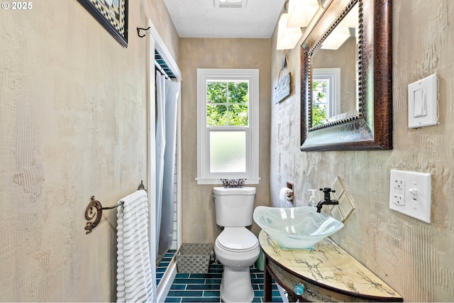 1112 S 6th St, Cottage Grove, OR 97424 - full bathroom featuring tile patterned flooring, a shower stall, radiator heating unit, and vanity