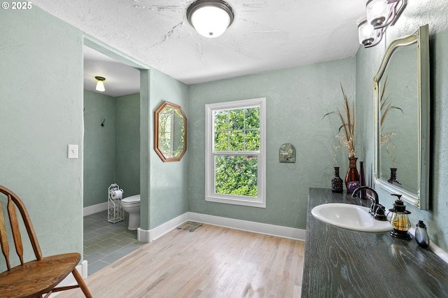 1112 S 6th St, Cottage Grove, OR 97424 - bathroom featuring vanity and wood finished floors