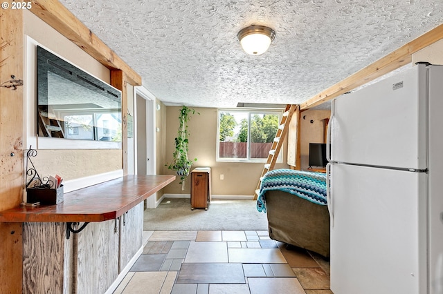 1112 S 6th St, Cottage Grove, OR 97424 - kitchen with freestanding refrigerator and carpet flooring