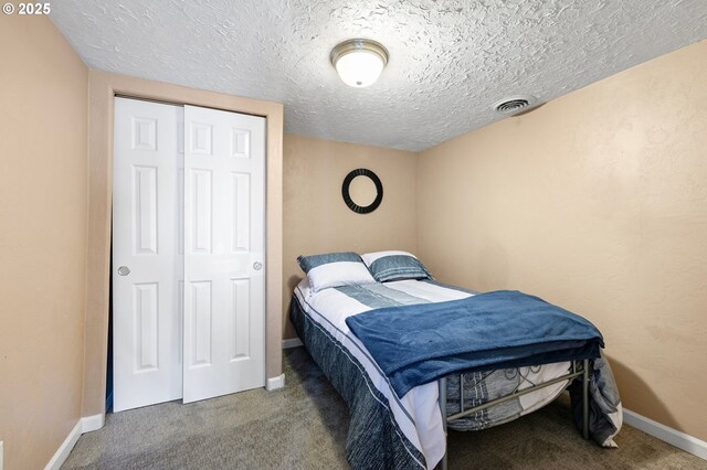 1112 S 6th St, Cottage Grove, OR 97424 - carpeted bedroom with a textured ceiling and baseboards