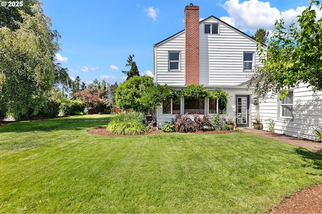 1112 S 6th St, Cottage Grove, OR 97424 - back of property featuring a yard and a chimney