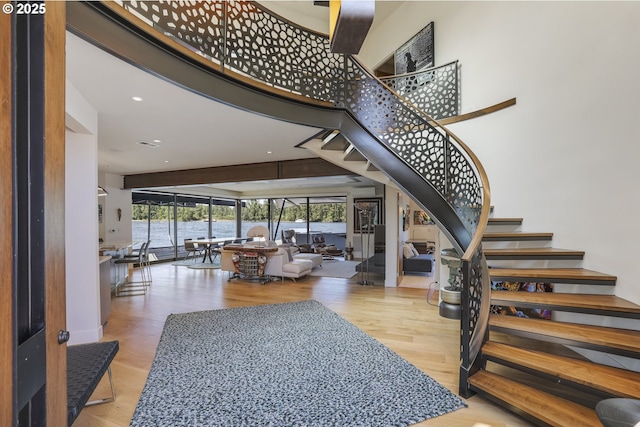 3939 N Marine Dr Unit 12, Portland, OR 97217 - stairs with wood finished floors and recessed lighting