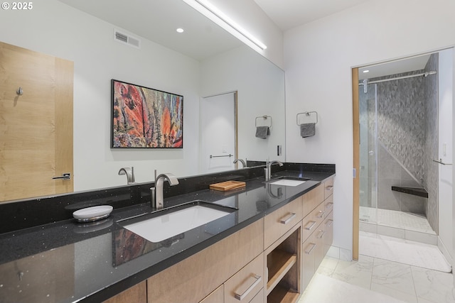 3939 N Marine Dr Unit 12, Portland, OR 97217 - full bath featuring marble look tile flooring, a stall shower, double vanity, and recessed lighting