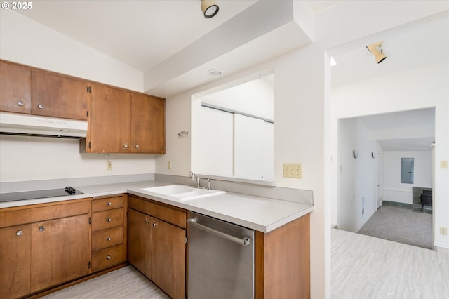 kitchen featuring light wood-style floors, white fridge with ice dispenser, light countertops, baseboards, and under cabinet range hood