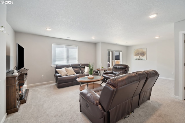 1540 19th Ave, Forest Grove, OR 97116 - living room with light carpet, recessed lighting, and a textured ceiling