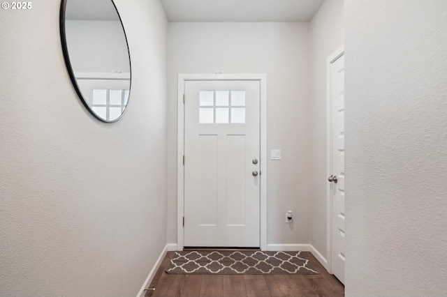1540 19th Ave, Forest Grove, OR 97116 - doorway with dark wood-type flooring and baseboards