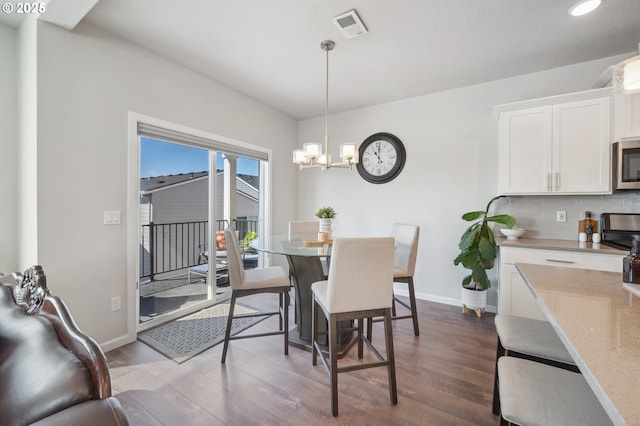 1540 19th Ave, Forest Grove, OR 97116 - dining area featuring a chandelier, dark wood finished floors, and recessed lighting