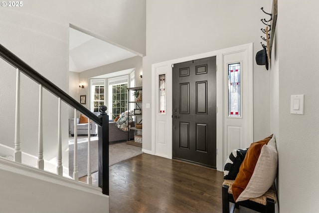 foyer with dark wood-type flooring