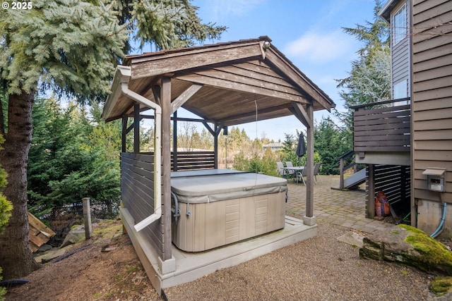 view of patio with a gazebo and a hot tub