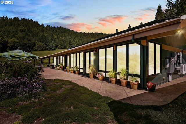 1104 Upper Cow Creek Rd, Azalea, OR 97410 - view of patio featuring a forest view
