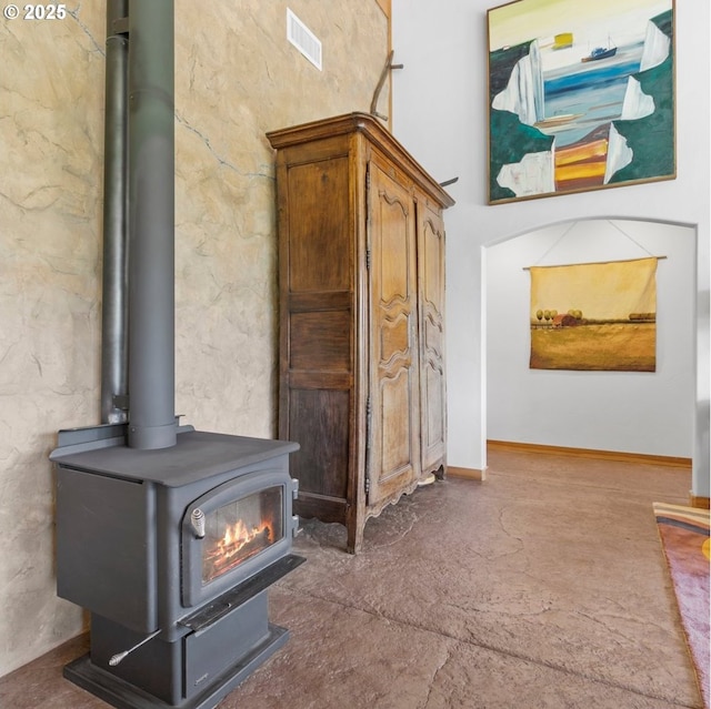 1104 Upper Cow Creek Rd, Azalea, OR 97410 - detailed view of a wood stove and concrete floors