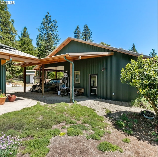 1104 Upper Cow Creek Rd, Azalea, OR 97410 - back of property with a carport and an outbuilding