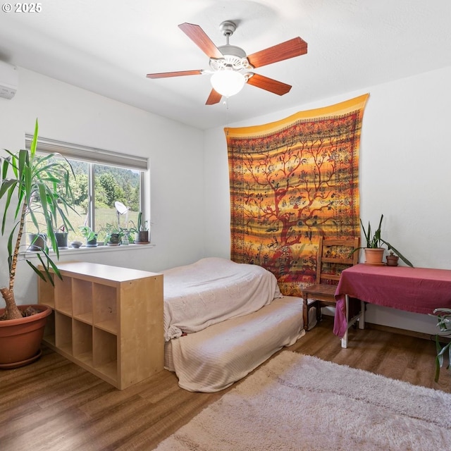 1104 Upper Cow Creek Rd, Azalea, OR 97410 - bedroom featuring wood finished floors and a ceiling fan