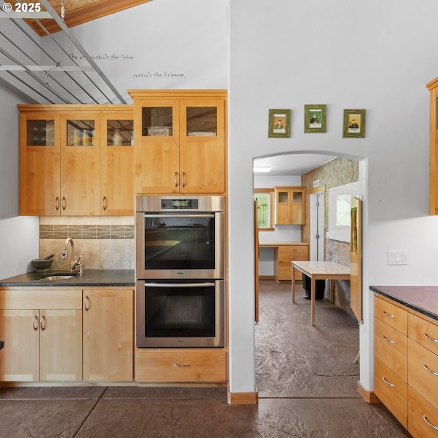 1104 Upper Cow Creek Rd, Azalea, OR 97410 - kitchen with a sink, stainless steel double oven, dark countertops, and backsplash