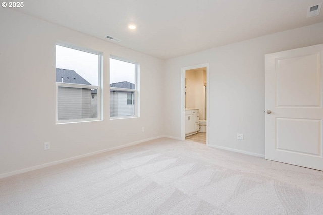 2990 T St, Springfield, OR 97477 - unfurnished bedroom with light colored carpet and connected bathroom