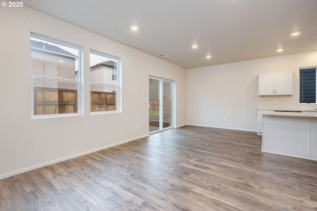 2990 T St, Springfield, OR 97477 - unfurnished living room with wood finished floors and recessed lighting