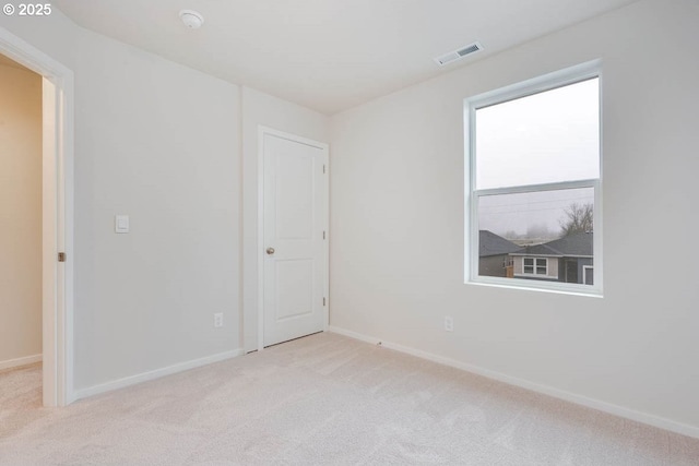 2990 T St, Springfield, OR 97477 - unfurnished room featuring light colored carpet and baseboards