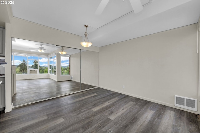 1313 Lincoln St Unit 708, Eugene, OR 97401 - unfurnished room with ceiling fan and dark wood-style floors