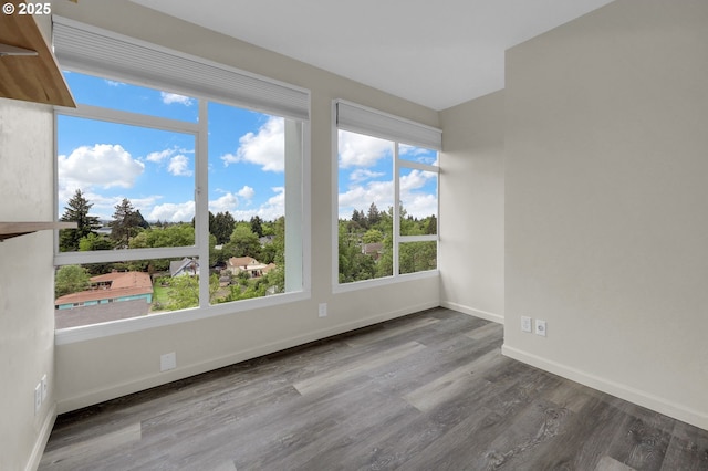 1313 Lincoln St Unit 708, Eugene, OR 97401 - empty room featuring wood finished floors and baseboards