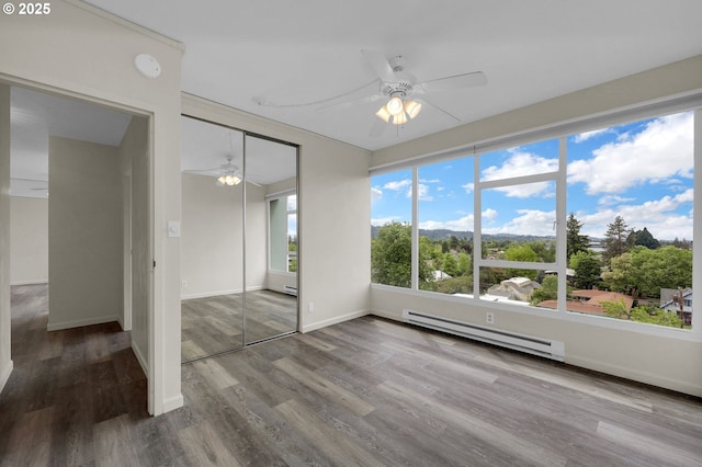 1313 Lincoln St Unit 708, Eugene, OR 97401 - unfurnished sunroom featuring baseboard heating