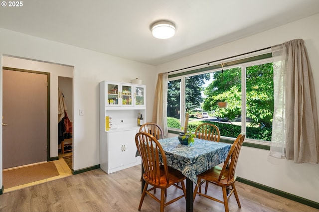 14511 NE Brazee Ct, Portland, OR 97230 - dining room with light wood-style flooring and baseboards