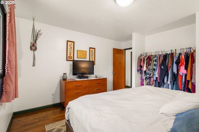 14511 NE Brazee Ct, Portland, OR 97230 - bedroom featuring dark wood finished floors and baseboards