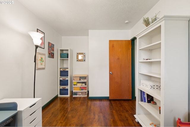 14511 NE Brazee Ct, Portland, OR 97230 - office featuring dark wood finished floors and baseboards