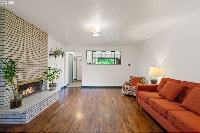 14511 NE Brazee Ct, Portland, OR 97230 - living room featuring wood finished floors, a fireplace, and baseboards