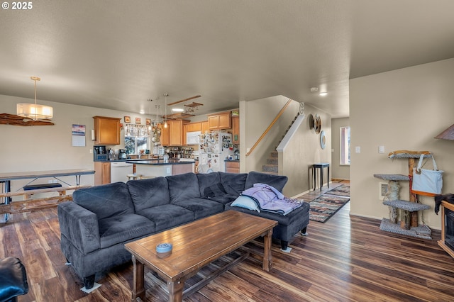 living room featuring dark hardwood / wood-style flooring