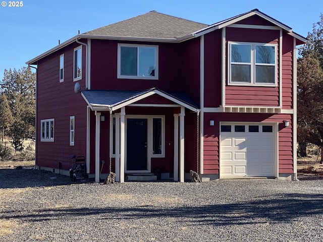 front of property featuring a garage