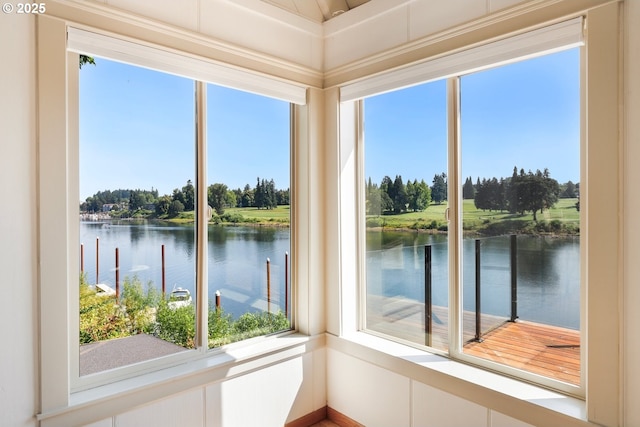 10150 S Riverside Dr, Portland, OR 97219 - unfurnished sunroom featuring a water view, plenty of natural light, and view of wooded area