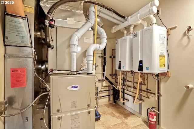 utility room with water heater and heating unit