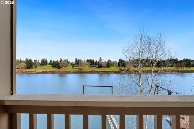 water view with a tree filled landscape