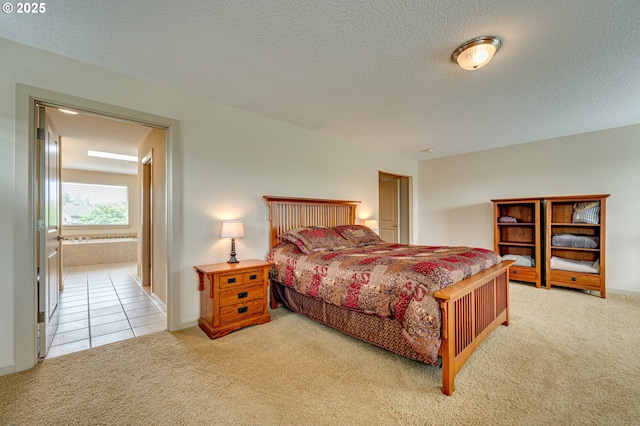 1551 S 14th Cir, Ridgefield, WA 98642 - bedroom featuring carpet, a textured ceiling, and tile patterned flooring