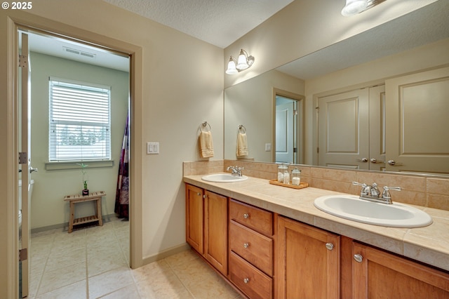 1551 S 14th Cir, Ridgefield, WA 98642 - full bathroom with double vanity and tile patterned flooring