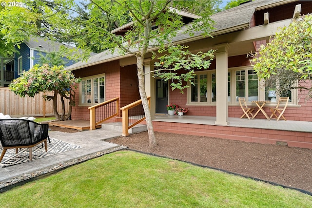 2340 SW Dolph Ct, Portland, OR 97219 - rear view of house with roof with shingles and a porch