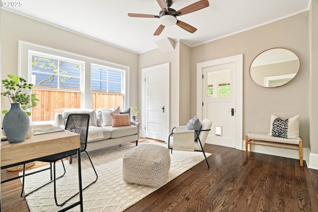 2340 SW Dolph Ct, Portland, OR 97219 - living room featuring wood finished floors, healthy amount of natural light, ornamental molding, ceiling fan, and baseboards