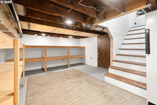 2340 SW Dolph Ct, Portland, OR 97219 - below grade area featuring stairs and freestanding refrigerator