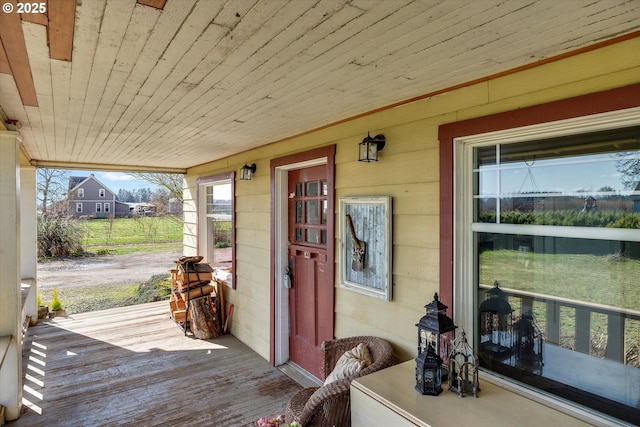 wooden deck featuring covered porch