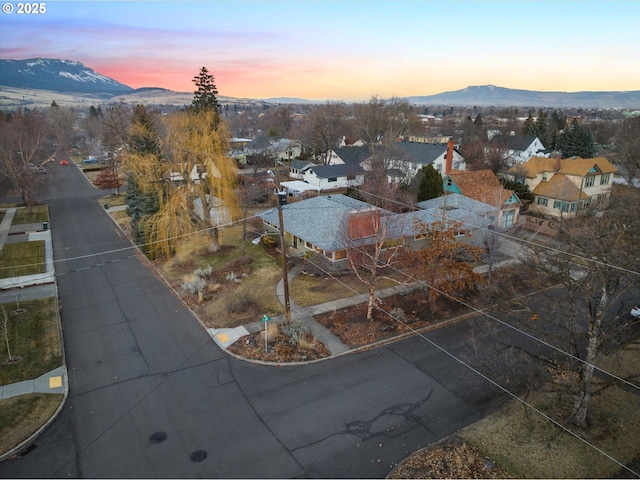 aerial view at dusk with a mountain view